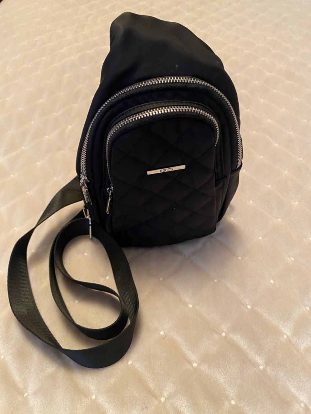 Roots  Black quilted Nylon sling bag